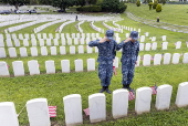 Flags placed on military veteran graves for Memorial Day in Brooklyn