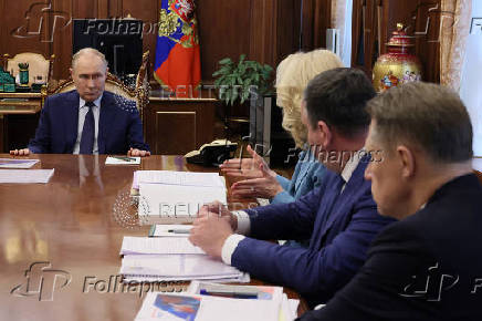 Russian President Vladimir Putin chairs a meeting on social issues, in Moscow