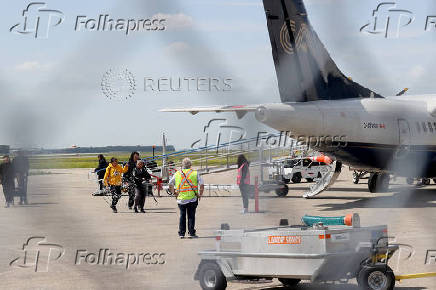 Fire evacuees arrive in Winnipeg