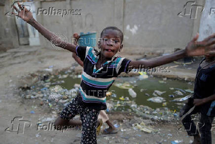 FILE PHOTO: A boy plays in a poor neighbourhood in N'djamena