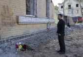 Ukrainian President Zelensky visits site of Russian missile strike in Kyiv