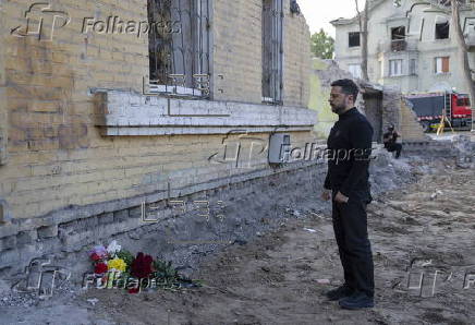 Ukrainian President Zelensky visits site of Russian missile strike in Kyiv