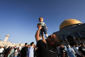 Palestinians pray on the first day of the Muslim holiday of Eid al-Adha, in Jerusalem's Old City
