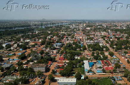 An aerial view from the plane shows the skyline of Juba