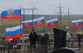 People visit a cemetery in Donetsk