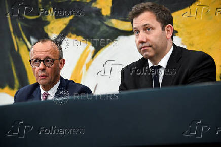 Merz, Klingbeil, Soeder and Esken attend a press conference at the chancellery in Berlin