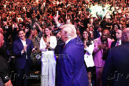 U.S. President Donald Trump attends the UFC-316 mixed martial arts event, in Newark