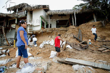 Erick weakens to tropical storm over Mexico, leaves trail of damage