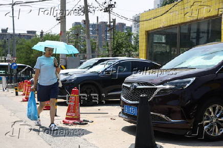Beijing issues orange alert for heatwave