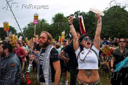 Anti-racism protesters attend a counter protest, on the day of an anti-immigration demonstrations outside the Bell Hotel in Epping