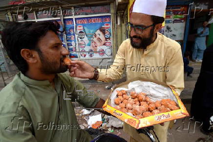 Markazi Muslim League celebrate after Pakistan shoots down Indian fighter jets