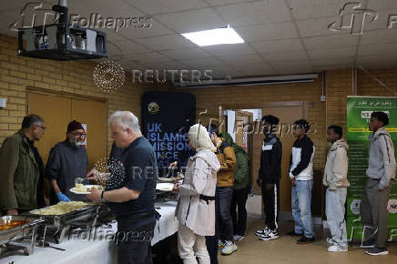 Khizra Mosque hosts a lunch as part of its Eid al-Adha celebrations, in Manchester