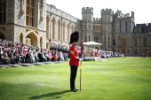 A member of the Coldstream Guards stands in the Quadrangle ahead of a ceremony to present new Colours to the 1st and 2nd Battalion (Number 7 Company) the Coldstream Guards at Windsor Castle