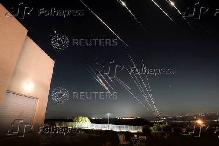 Missiles launched from Iran are intercepted as seen from the Israeli-occupied Golan Heights