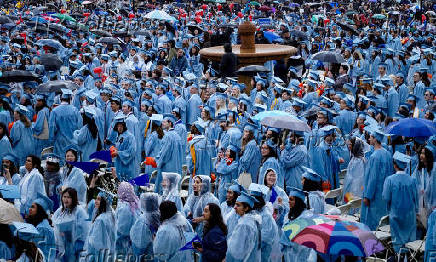 FILE PHOTO: Graduating students attend Columbia University's commencement ceremony on its main campus, in Manhattan, New York City