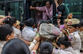 Protests in Delhi after student set herself on fire at college in Odisha