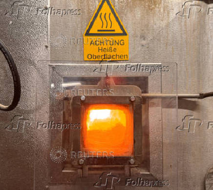 Flames incinerate waste in a combustion chamber of the garbage facility in Rosenheim