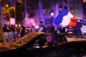 Champions League - Fans celebrate after Paris St Germain qualifies for the final