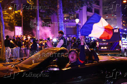 Champions League - Fans celebrate after Paris St Germain qualifies for the final