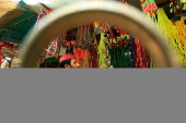 Roadside shop sells ornaments ahead of Eid al-Adha in Peshawar