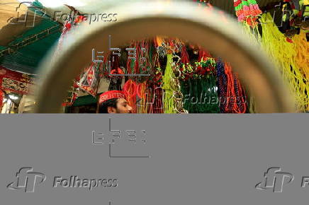 Roadside shop sells ornaments ahead of Eid al-Adha in Peshawar