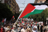 Pro-Palestinian protesters attend a demonstration calling for an end to the bombing in Gaza, in Rome