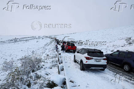 FILE PHOTO: Snowfall during a cold front near Ceres in 2024
