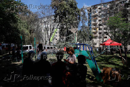 Apartment building damaged during Russian drone and missile strikes, in Kyiv
