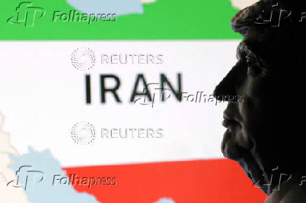 FILE PHOTO: Illustration shows 3D printed miniature of U.S. president Donald Trump and map of Iran