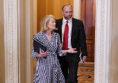 U.S. Senator Lisa Murkowski (R-AK) walks to a policy luncheon meeting on Capitol Hill