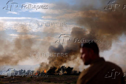 A wildfire burns on the outskirts of Valmojado
