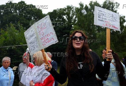 Protests outside a hotel used for housing asylum seekers, in Epping