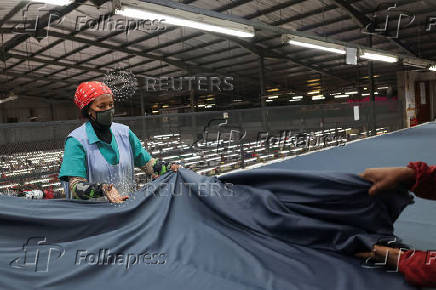 Workers perfom their duties at Quantum apparel factory on the outskirts of Maseru