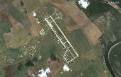 A satellite image shows the aftermath of a drone strike at the Belaya air base