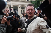 Political activist Tommy Robinson faces court over journalist harassment