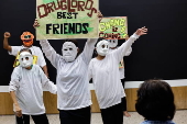 Families of victims of extra-judicial killings dramatize their experience through theater program