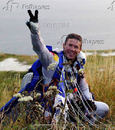 FILE PHOTO: Skydiver Felix Baumgartner celebrates after successful freefall cross English Channel
