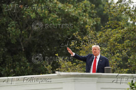 U.S. President Trump and architect McCrery on a walk on the roof of the White House in Washington