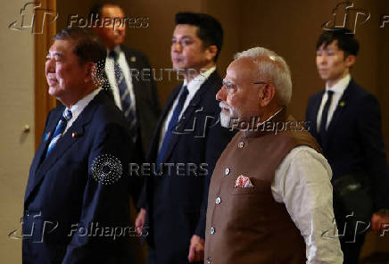 India's Prime Minister Modi and Japan's PM Ishiba arrive at the India-Japan Economic Forum in Tokyo