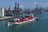 A drone view shows an ASL Shipping cargo ship at Kwai Tsing Container Terminals in Hong Kong