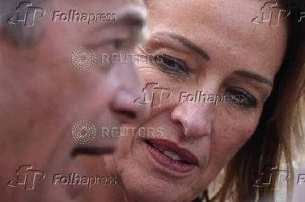 Britain?s Reform Party leader Farage and newly elected MP Pochin speak to journalists outside Houses of Parliament in London