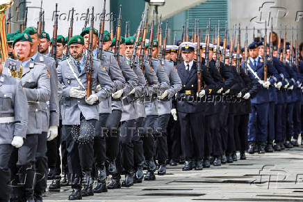 Honour guards of the German armed forces Bundeswehr walk on the day of the visit of Ukrainian President Volodymyr Zelenskiy, in Berlin