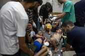 Palestinian children injured in Israeli airstrike on displaced persons' tent in Khan Yunis