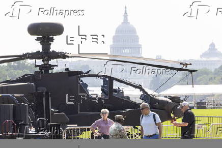 Helicopters and other heavy equipment staged for DC military parade