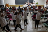 Families of victims of extra-judicial killings dramatize their experience through theater program