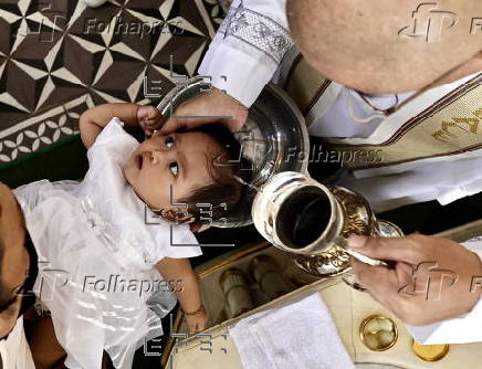 Mass baptism ceremony for children in Bacoor city