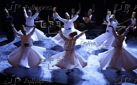 Members of Whirling Dervishes perform in Tunis