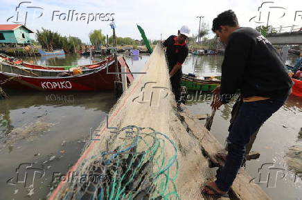 Daily life of fishermen in a traditional fishing port