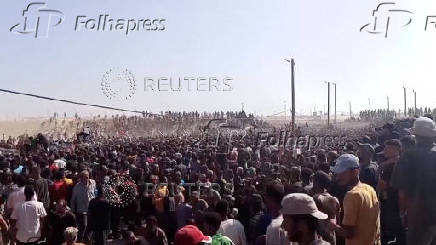 Palestinians rush to get aid boxes, in Rafah