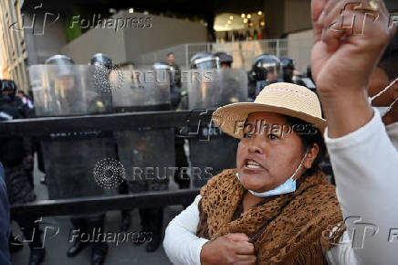 Supporters of Evo Morales's candidacy clash with police, in La Paz